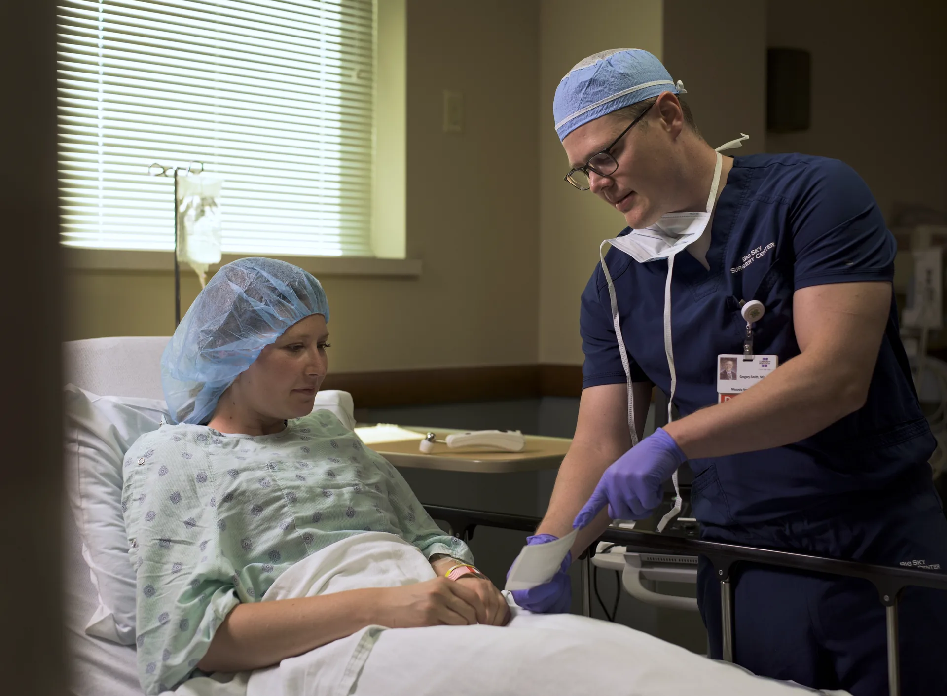 Anesthesiologist and patient before surgery